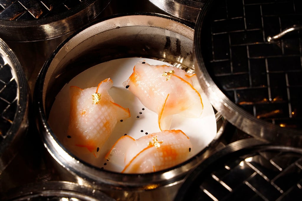 Chef Tse fashions shrimp dumplings into goldfish, symbols of luck and prosperity.
