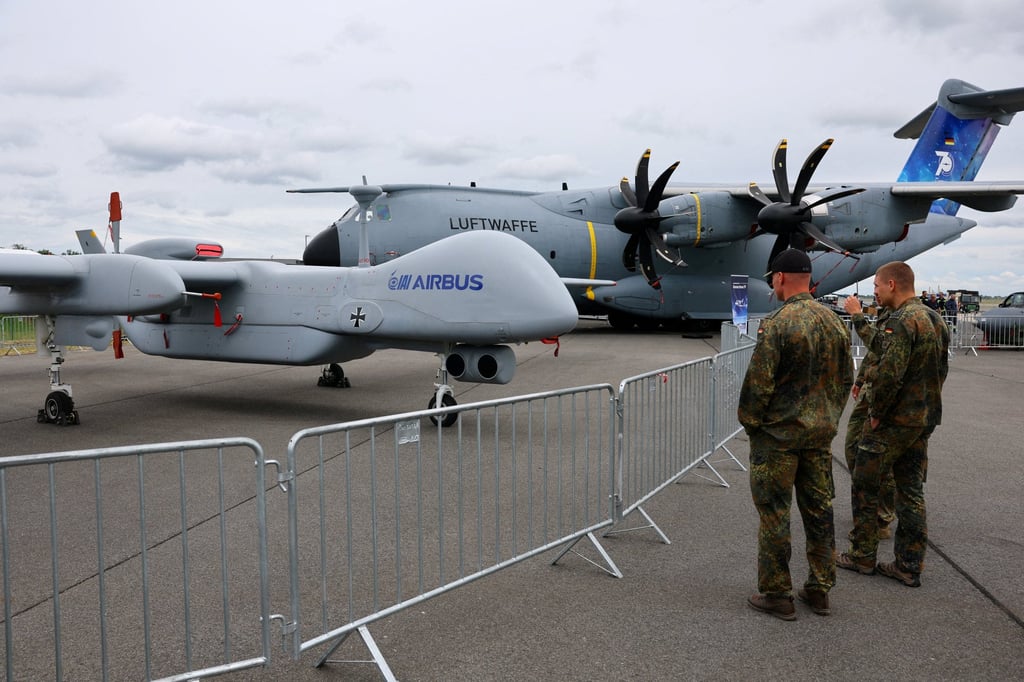Members of the German air force look at a German Heron TP drone at the International Aerospace Exhibition ILA at Schoenefeld Airport, south of Berlin, in June. Photo: Reuters Members of the German air force look at a German Heron TP drone at the International Aerospace Exhibition ILA at Schoenefeld Airport, south of Berlin, in June. Photo: Reuters