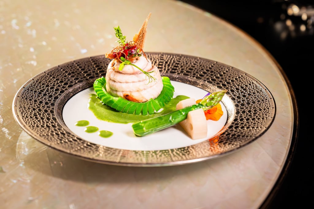 Subtly evoking the movement of a swimming fish, the steamed Macau sole fillet is a much-celebrated dish at The Eight.