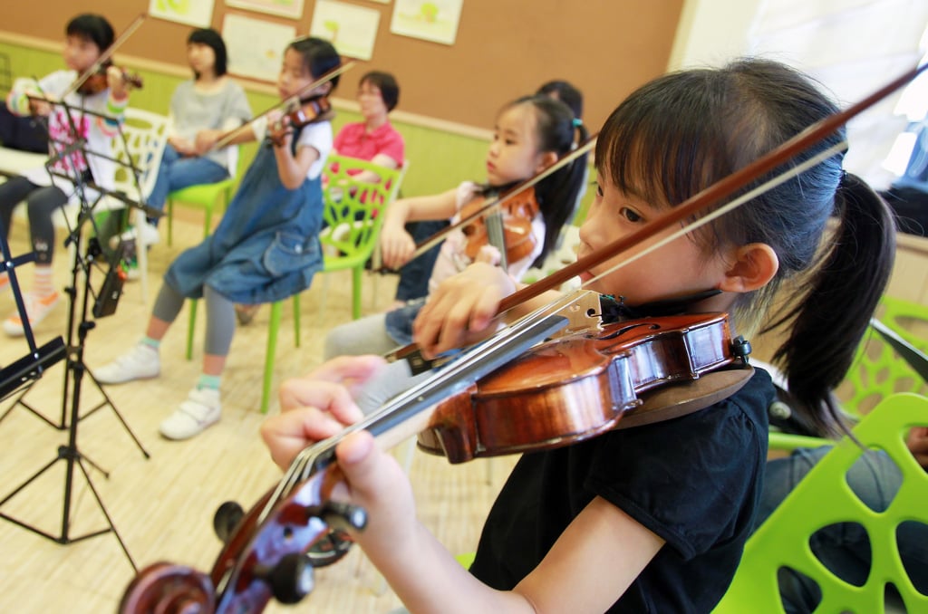 Music can help children practise patience and focus. Photo: Handout Music can help children practise patience and focus. Photo: Handout