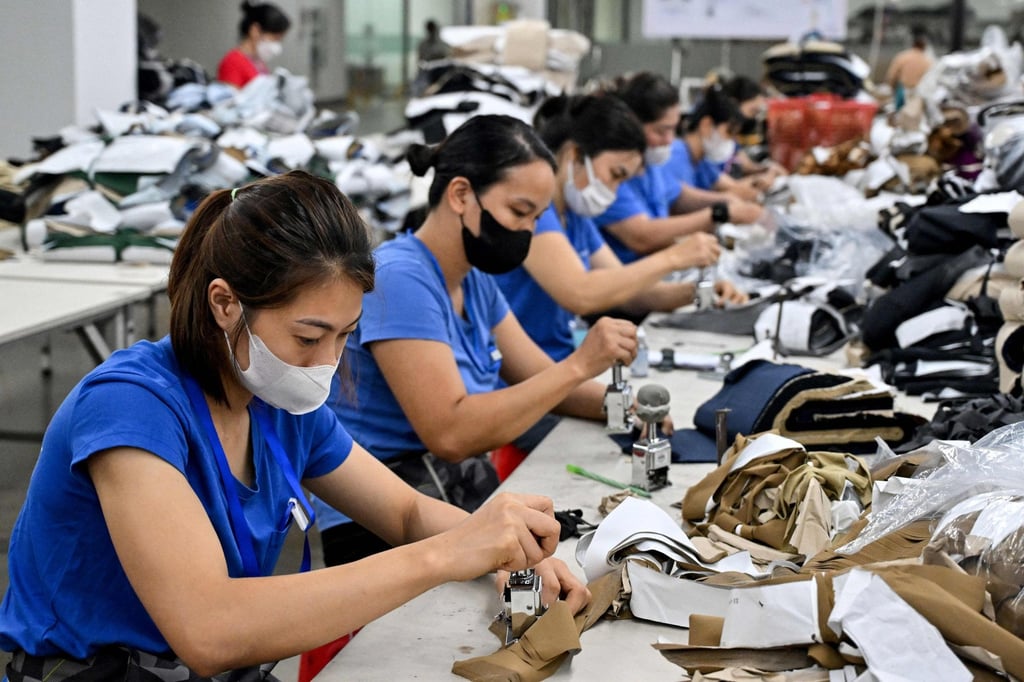 Employees work with fabric at a garment factory in Thai Nguyen province, Vietnam, on July 2, 2025. Photo: AFP Employees work with fabric at a garment factory in Thai Nguyen province, Vietnam, on July 2, 2025. Photo: AFP