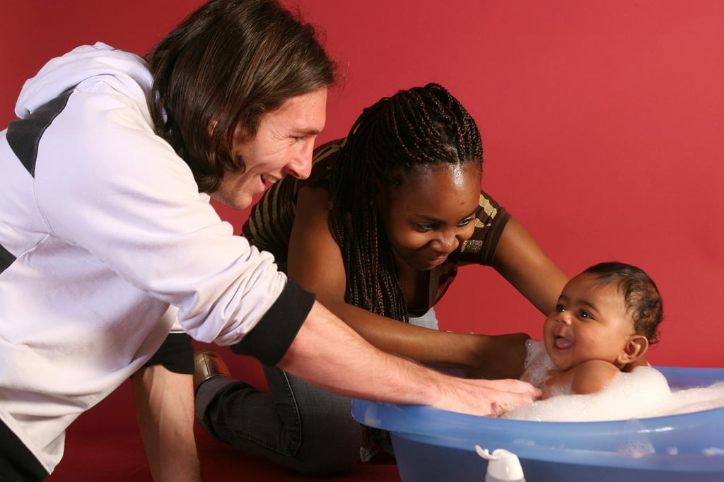 Lionel Messi, then 22, helps bathe Lamine Yamal, who was merely six months old at the time, with Yamal’s mother, Sheila Ebana, during a photo session in Barcelona in 2007. Photo: AP Photo Lionel Messi, then 22, helps bathe Lamine Yamal, who was merely six months old at the time, with Yamal’s mother, Sheila Ebana, during a photo session in Barcelona in 2007. Photo: AP Photo