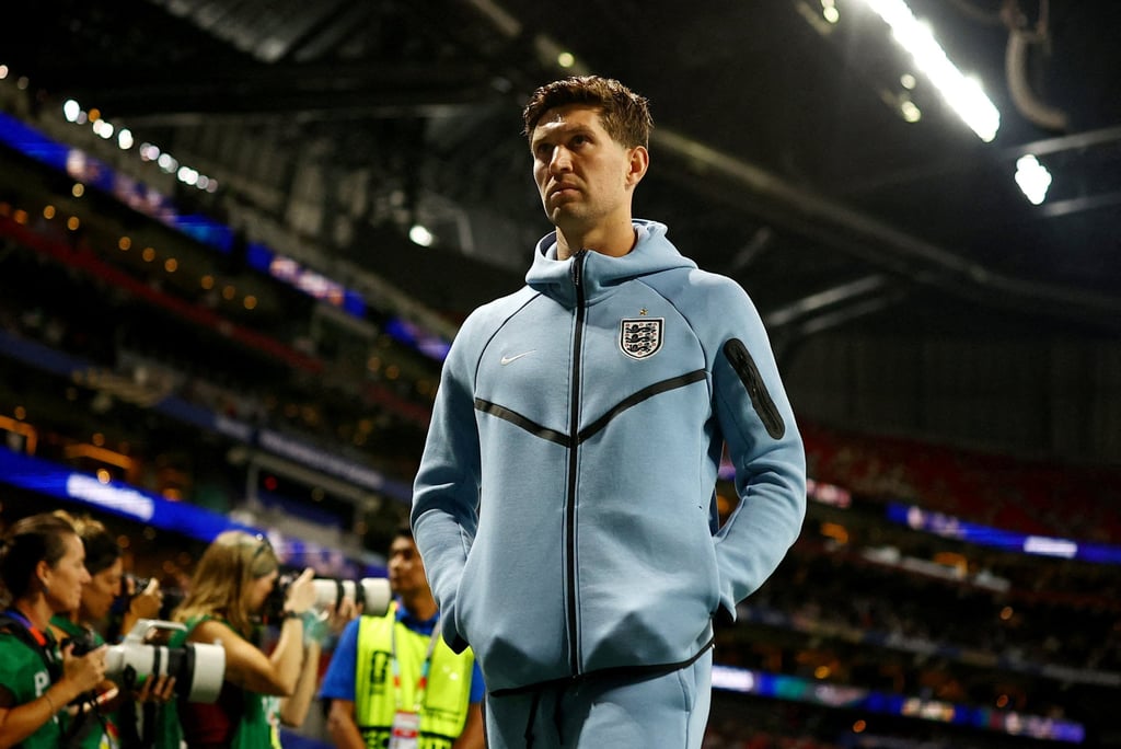 England defender John Stones will bring “personality and charisma”, Chivu says. Photo: Reuters England defender John Stones will bring “personality and charisma”, Chivu says. Photo: Reuters