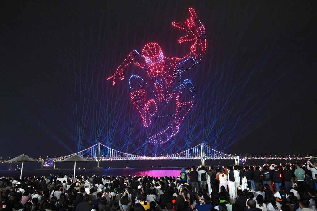 A swarm of 1,500 drones forms the shape of Spider-Man above Gwangan Bridge during a light show at Gwangalli Beach in Busan on May 2. Photo: AFP A swarm of 1,500 drones forms the shape of Spider-Man above Gwangan Bridge during a light show at Gwangalli Beach in Busan on May 2. Photo: AFP