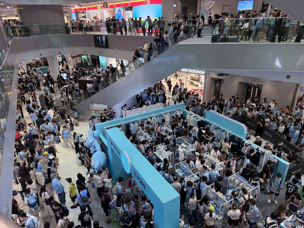 Fans gather around the Manchester City pop-up shop at Kai Tak Mall. Last year’s Football Festival injected HK$437 million into the local economy. Photo: Stephy Zhang Fans gather around the Manchester City pop-up shop at Kai Tak Mall. Last year’s Football Festival injected HK$437 million into the local economy. Photo: Stephy Zhang
