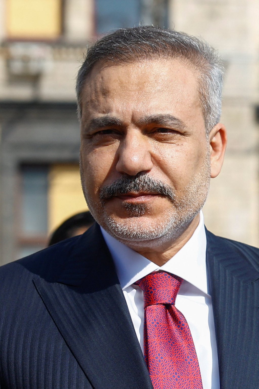 Turkish Foreign Minister Hakan Fidan looks on during a visit to a makeshift memorial to fallen Ukrainian defenders in Kyiv, Ukraine, on July 16. Photo: Reuters Turkish Foreign Minister Hakan Fidan looks on during a visit to a makeshift memorial to fallen Ukrainian defenders in Kyiv, Ukraine, on July 16. Photo: Reuters