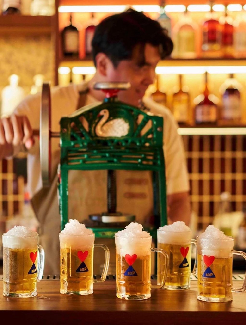 To make the BOP somaek, Jang first freezes soju, then shaves it using a Singaporean ice kacang machine and piles the flakes atop beer. Photo: Instagram/bop_bartendersofpony To make the BOP somaek, Jang first freezes soju, then shaves it using a Singaporean ice kacang machine and piles the flakes atop beer. Photo: Instagram/bop_bartendersofpony