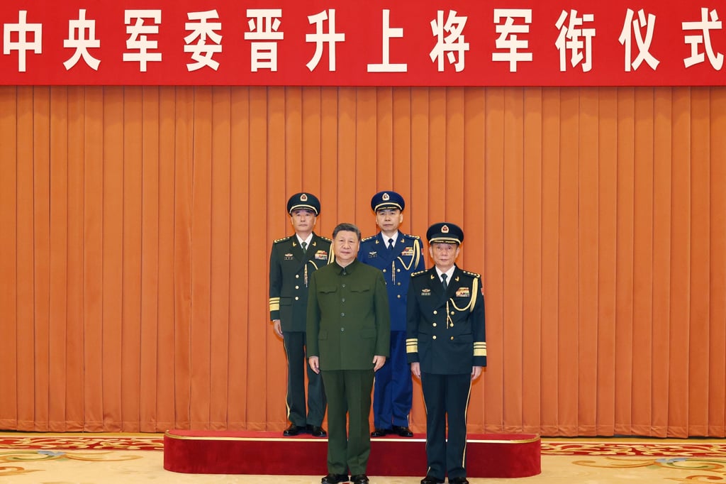 President Xi Jinping, chairman of the Central Military Commission, poses with CMC vice-chairman Zhang Shengmin (front row), and the newly promoted Zhang Shuguang (back row, left) and Wang Gang, in Beijing on July 3. Photo: Xinhua