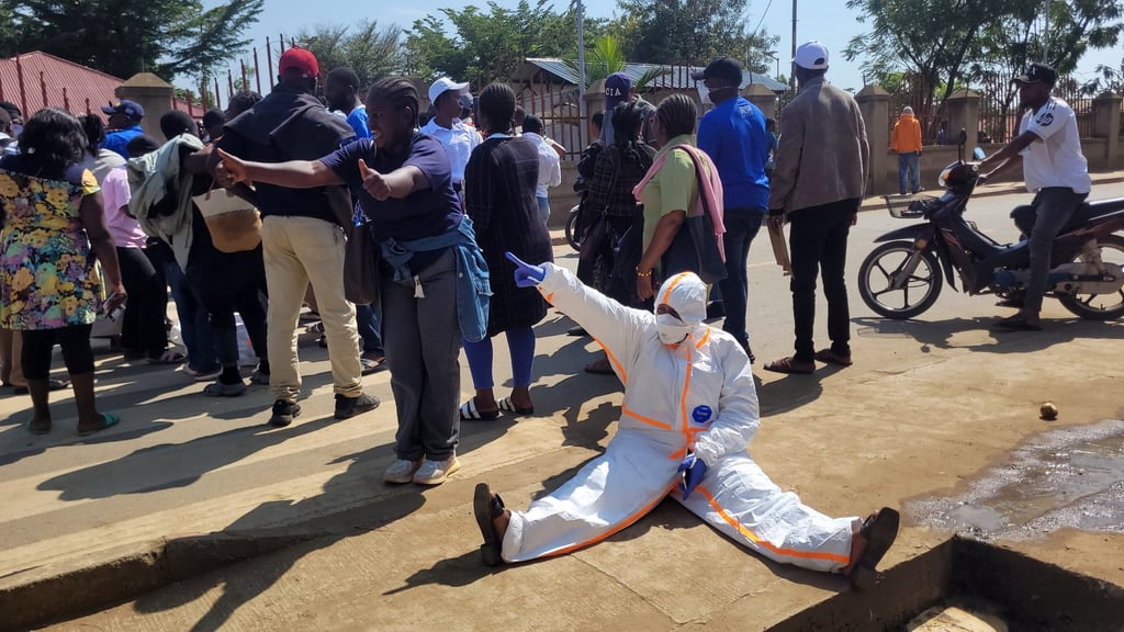 Health workers at the epicentre of the Ebola outbreak protest over unpaid wages at the provincial governor’s office in Ituri, DR Congo, on Thursday. Photo: AP