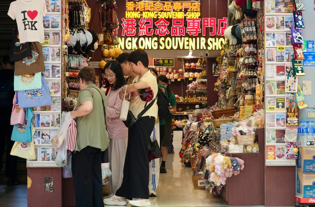 Tourists shop at Tsim Sha Tsui, Hong Kong, on August 7. Tourist arrivals are expected to reach 55 million this year, almost on par with the level in 2019. Photo: Jelly Tse