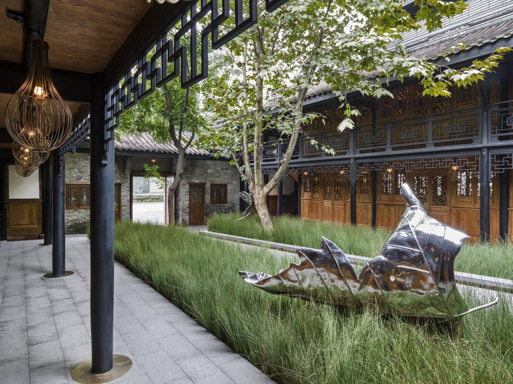 The entrance courtyard features modern artworks. Photo: Handout The entrance courtyard features modern artworks. Photo: Handout