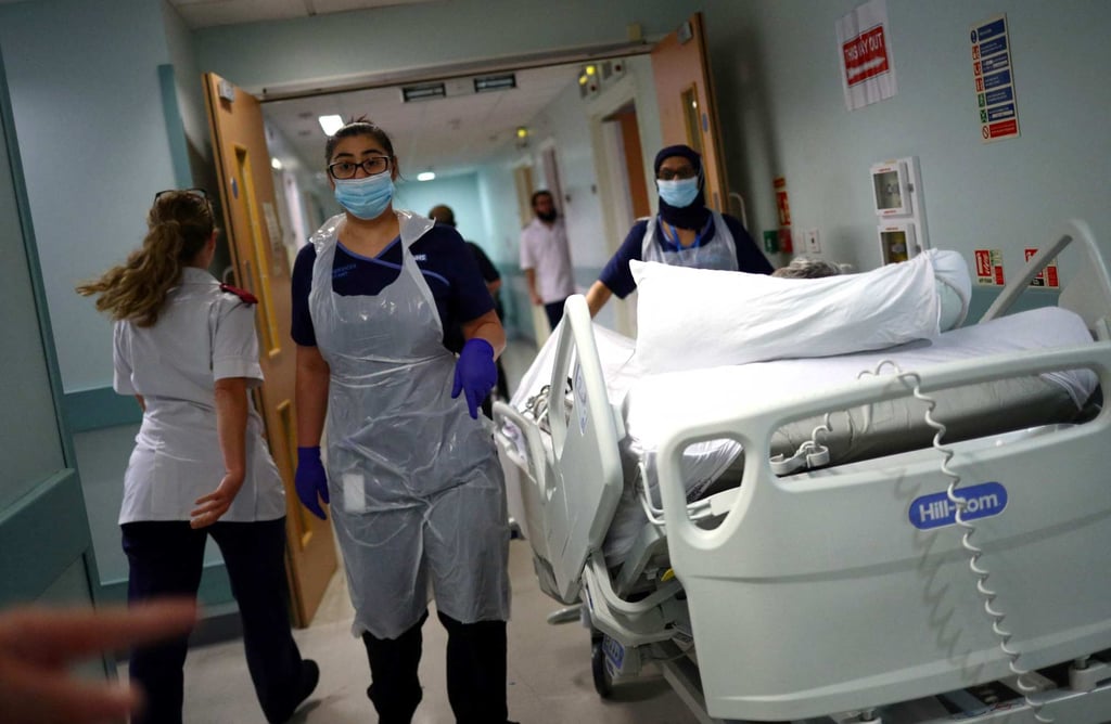Medical staff transfer a patient along a corridor at a hospital in Blackburn, northwest England, in 2020. Photo: AFP Medical staff transfer a patient along a corridor at a hospital in Blackburn, northwest England, in 2020. Photo: AFP