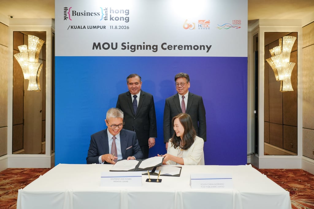 Southeast Asian Futures Initiative Centre chairman Tengku Datuk Seri Utama Zafrul Aziz (front, left) and SCMP publisher Tammy Tam sign a memorandum of understanding between their organisations in Kuala Lumpur. Photo: Handout Southeast Asian Futures Initiative Centre chairman Tengku Datuk Seri Utama Zafrul Aziz (front, left) and SCMP publisher Tammy Tam sign a memorandum of understanding between their organisations in Kuala Lumpur. Photo: Handout