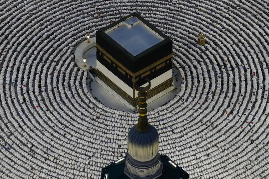 Muslim pilgrims offer evening prayers around the Kaaba, Islam’s holiest site in the holy city of Mecca, during the annual haj pilgrimage on May 24. Photo: AP