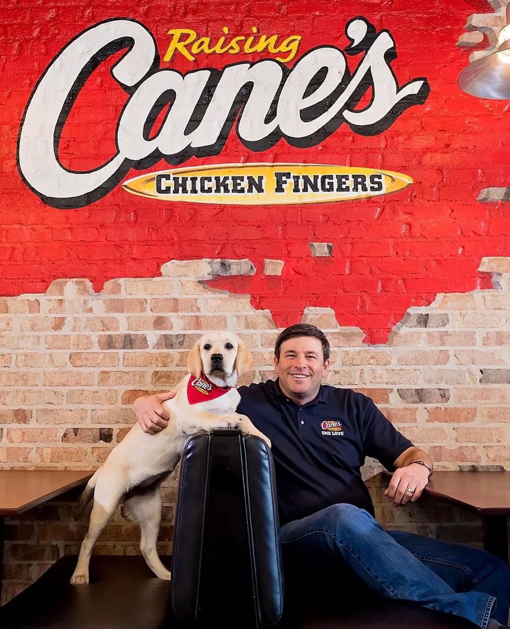 The yellow Labrador has been Raising Cane’s mascot since Todd Graves named the restaurant after his original dog, who lived from 1992 to 1998. Photo: @toddgraves/Instagram The yellow Labrador has been Raising Cane’s mascot since Todd Graves named the restaurant after his original dog, who lived from 1992 to 1998. Photo: @toddgraves/Instagram