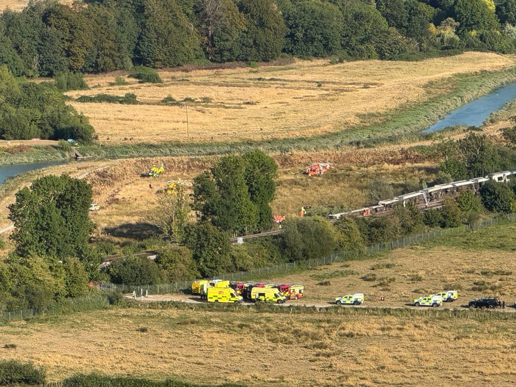 Emergency vehicles arrive at the scene of a train derailment near Lewes in East Sussex on Thursday. Photo: PA Wire via dpa Emergency vehicles arrive at the scene of a train derailment near Lewes in East Sussex on Thursday. Photo: PA Wire via dpa