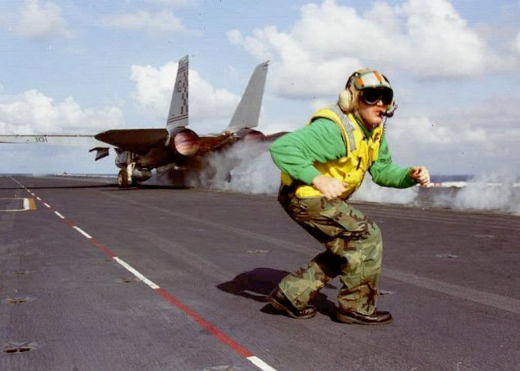 An F-14 Tomcat roars down a steam-driven catapult system on board the USS Nimitz in November 1998. Photo: AFP