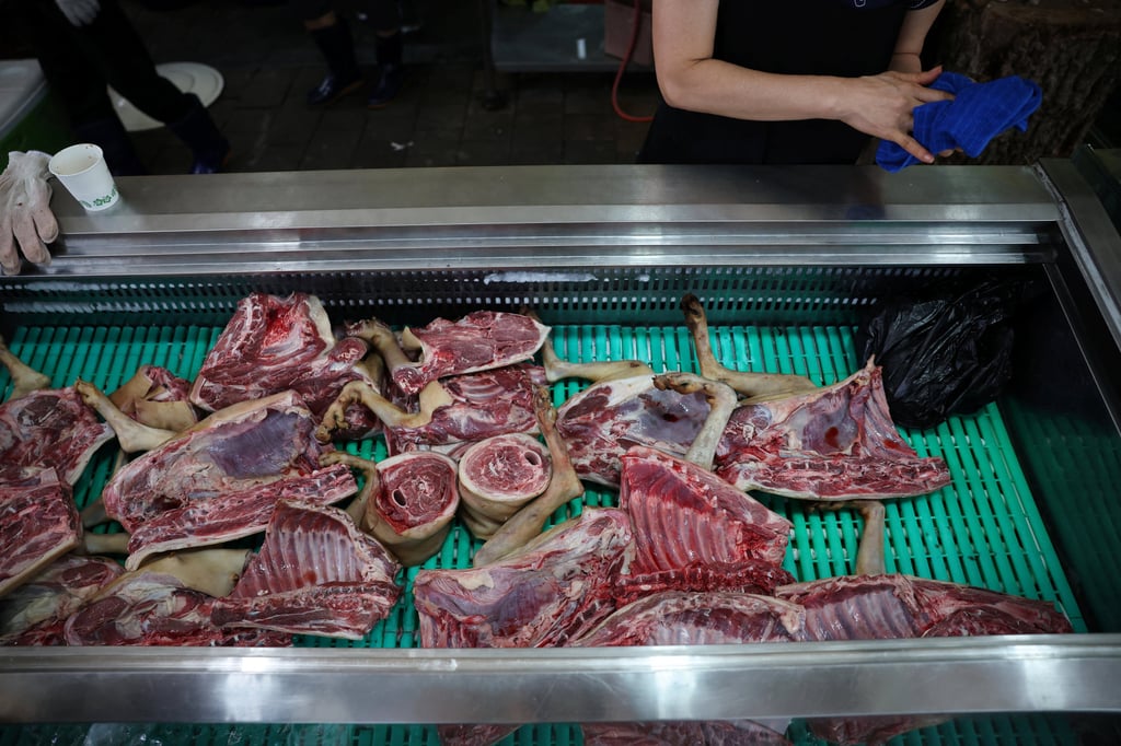 Dog meat is displayed for sale during Malbok, the last of Korea’s traditional hottest days of summer, at a restaurant selling dog meat and black goat meat stews in Seongnam, South Korea, on Friday. Photo: Reuters