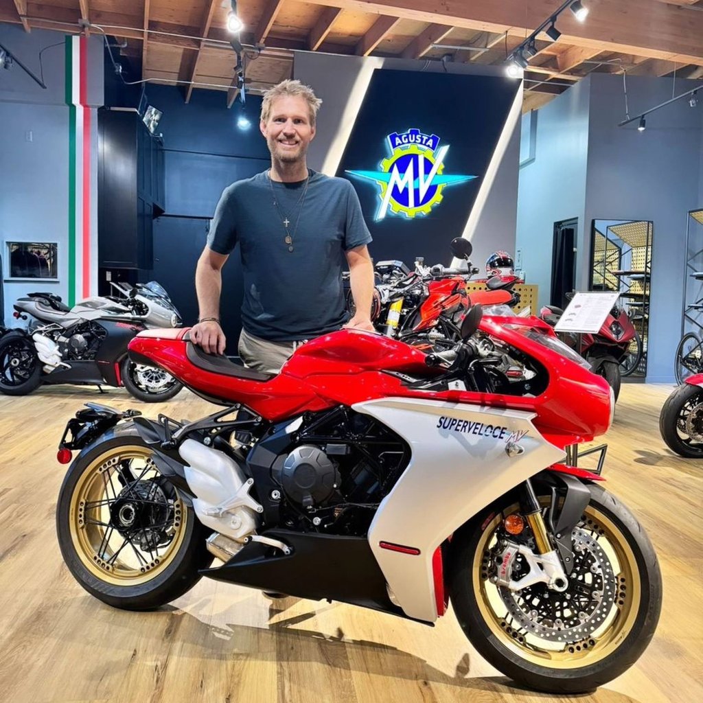 Brian Hickerson poses with an MV Agusta motorcycle in 2024. Photo: @mvagusta.losangeles/Instagram