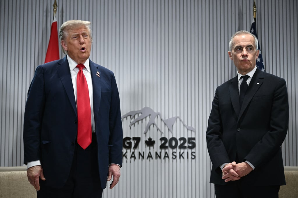 US President Donald Trump (left) speaks to the media while Canadian Prime Minister Mark Carney looks on, as they meet during the G7 Summit in Kananaskis, Alberta, Canada, in June 2025. Photo: TNS US President Donald Trump (left) speaks to the media while Canadian Prime Minister Mark Carney looks on, as they meet during the G7 Summit in Kananaskis, Alberta, Canada, in June 2025. Photo: TNS