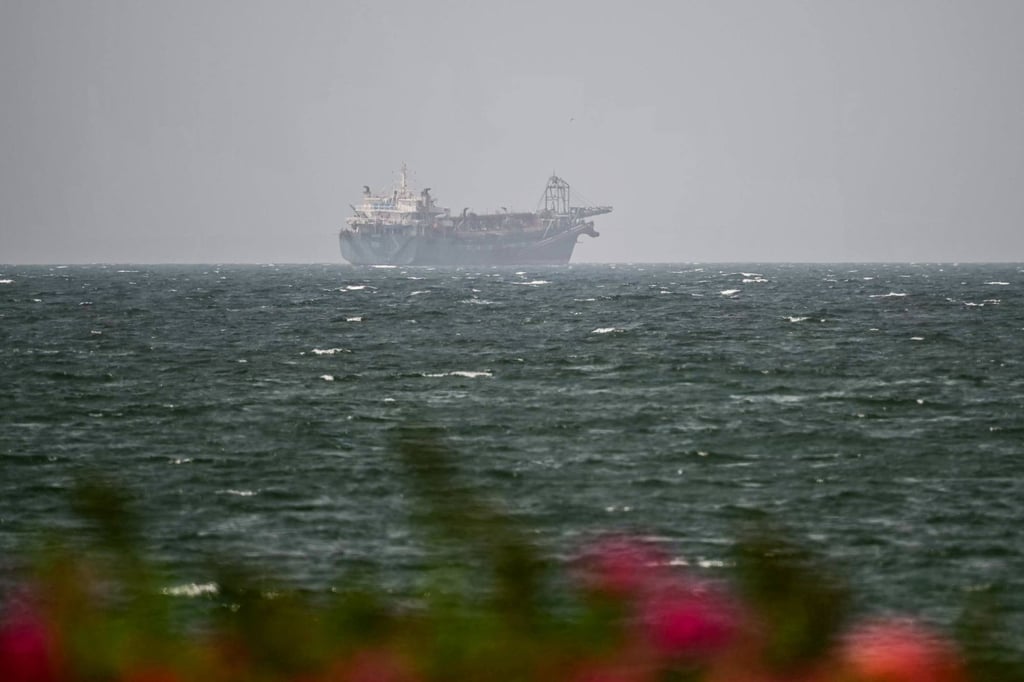 A vessel is seen off the coast of Sharjah in the United Arab Emirates on August 3. Photo: AFP A vessel is seen off the coast of Sharjah in the United Arab Emirates on August 3. Photo: AFP