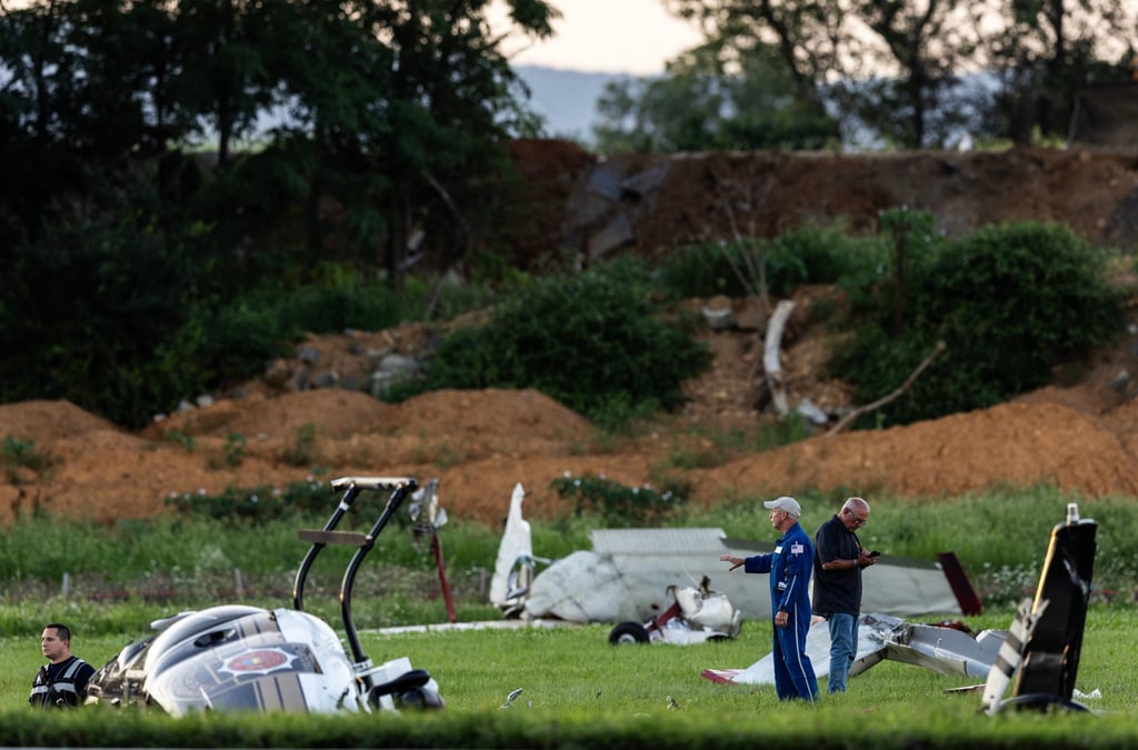 Photos and video on social media showed a helicopter on its side near aircraft debris in a field and a line of emergency vehicles near Carlisle. Photo: via AP