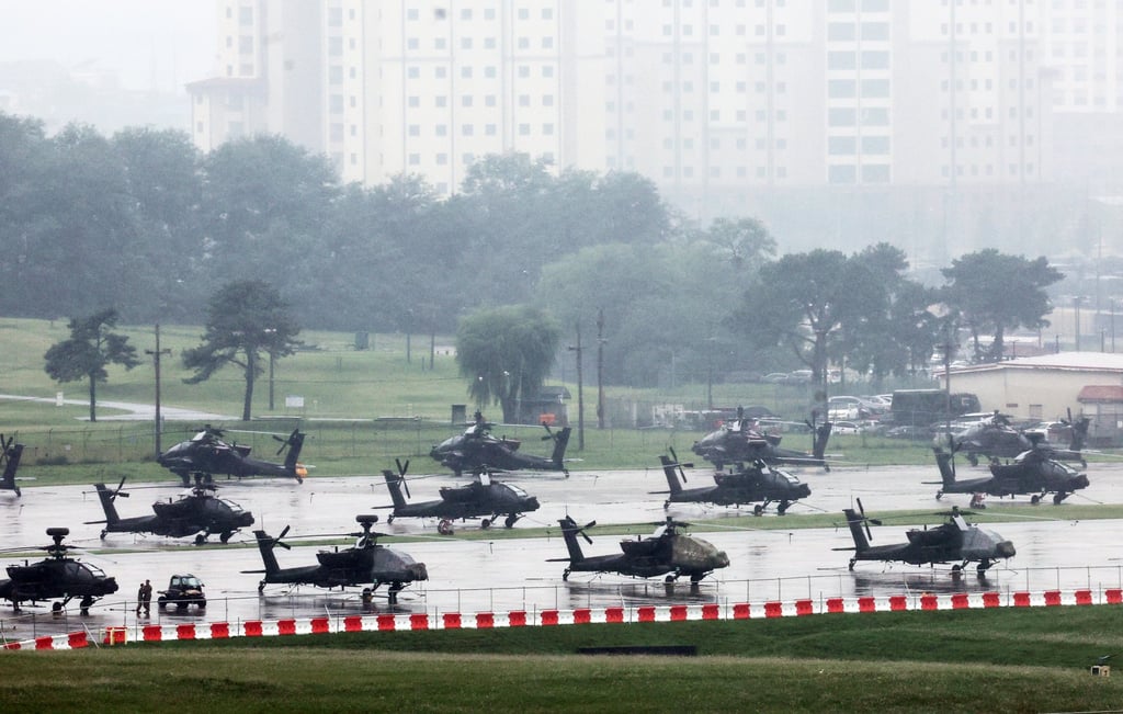 US Apache attack helicopters are parked at US Camp Humphreys in Pyeongtaek, south of Seoul, South Korea, on Friday. Photo: EPA/Yonhap