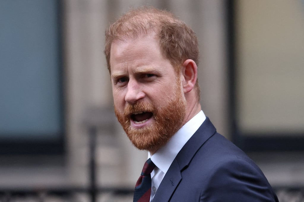Britain’s Prince Harry reacts as he walks outside the High Court in London in January. Photo: Reuters Britain’s Prince Harry reacts as he walks outside the High Court in London in January. Photo: Reuters