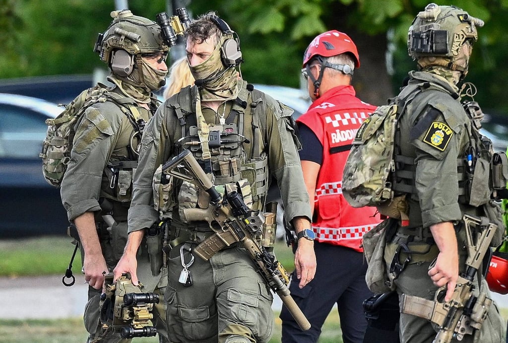 Police special forces work at the scene where an attacker with a sword wounded several people at a high school in Fagersta, central Sweden on Friday. Photo: AFP