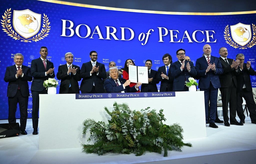 US President Donald Trump (centre) holds a signing of the founding charter at a “Board of Peace” meeting during the World Economic Forum annual meeting in Davos in January. Photo: AFP/Getty Images/TNS