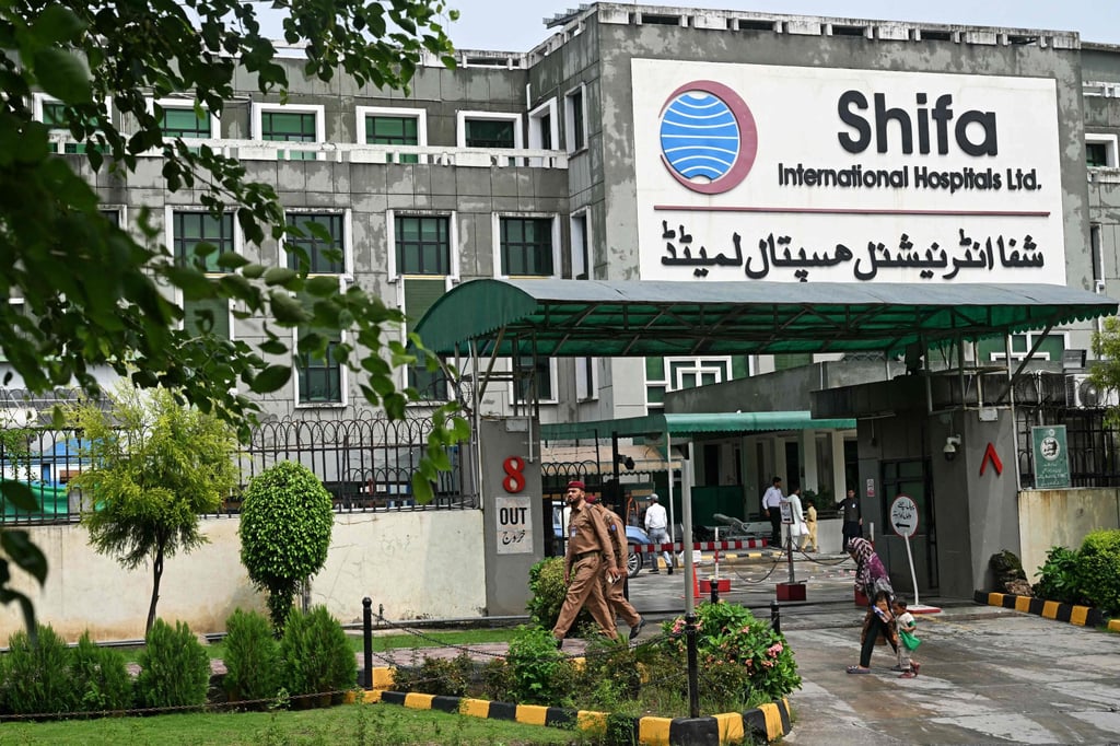 Police walk past Shifa International Hospital following Khan’s medical examination in Islamabad, Pakistan on Friday. Photo: AFP Police walk past Shifa International Hospital following Khan’s medical examination in Islamabad, Pakistan on Friday. Photo: AFP