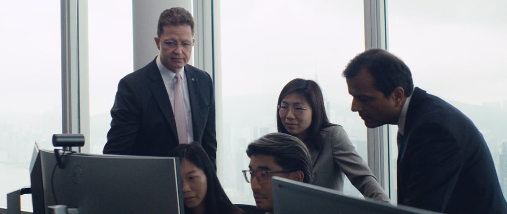 Tim Wannenmacher (left) says UBS’ success depends on having a strong team of staff all working towards common goals.