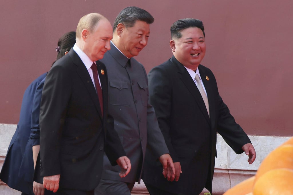 (From left) Russian President Vladimir Putin, Chinese President Xi Jinping and North Korean leader Kim Jong-un attend a military parade in Beijing last year. Photo: KCNA / Korea News Service / AP