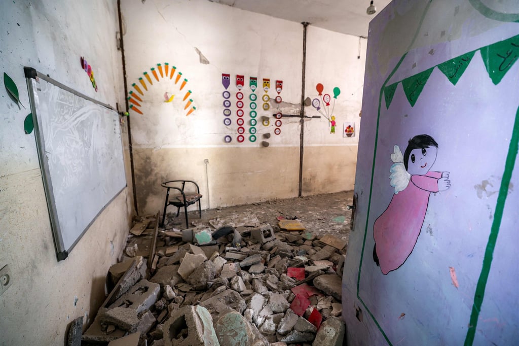 Inside the destroyed Shajareh Tayyebeh school. Photo: AFP