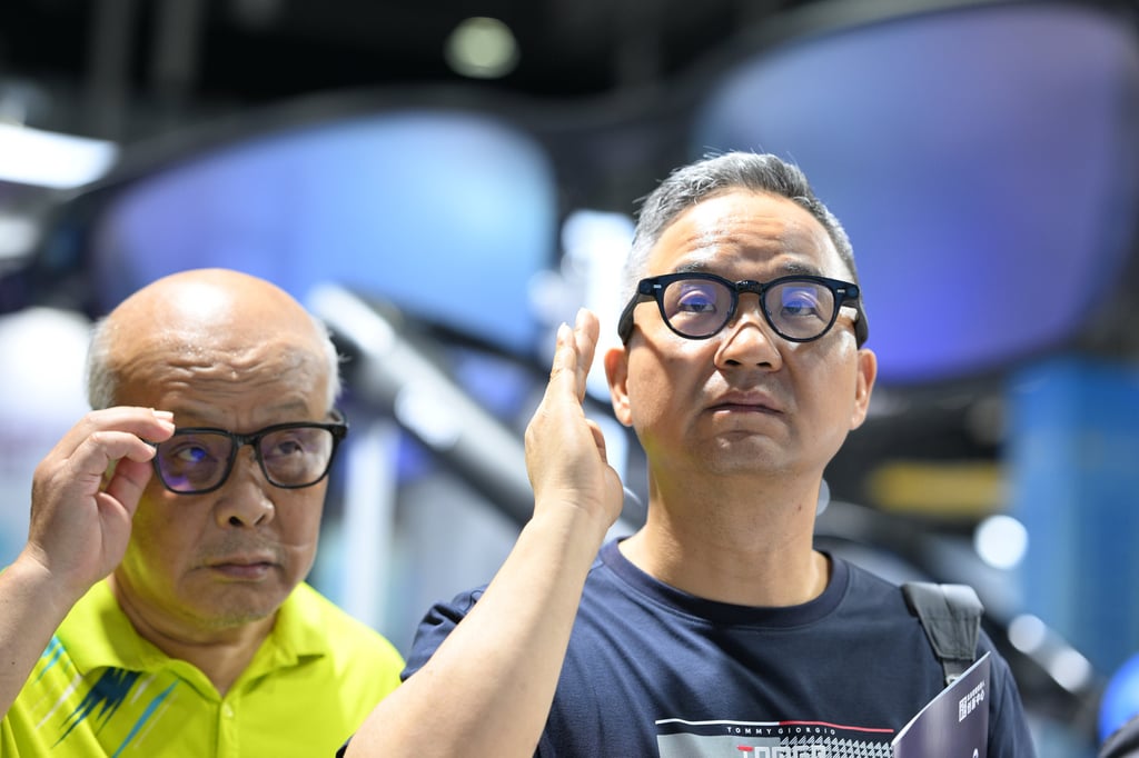 Visitors test smart glasses at an artificial intelligence industry event in Nanjing. Photo: CFOTO/Future Publishing/Getty Images Visitors test smart glasses at an artificial intelligence industry event in Nanjing. Photo: CFOTO/Future Publishing/Getty Images