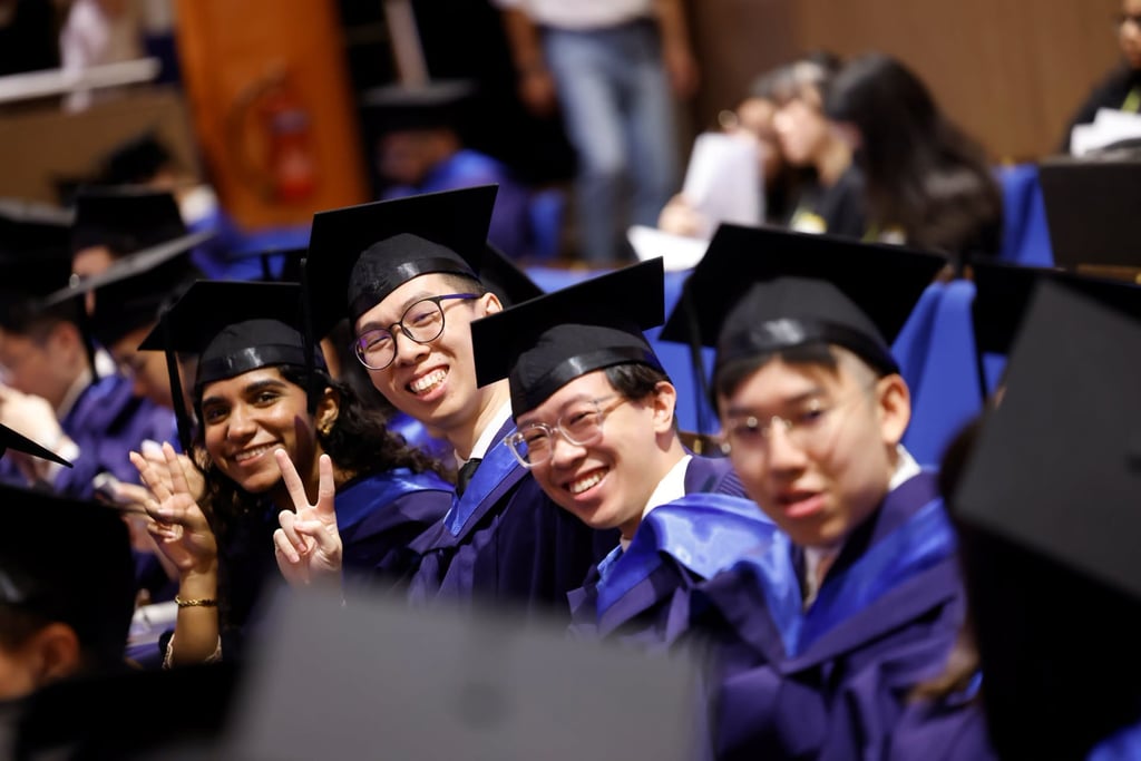 Graduates attend their graduation ceremony at the National University of Singapore in July. Photo: Handout