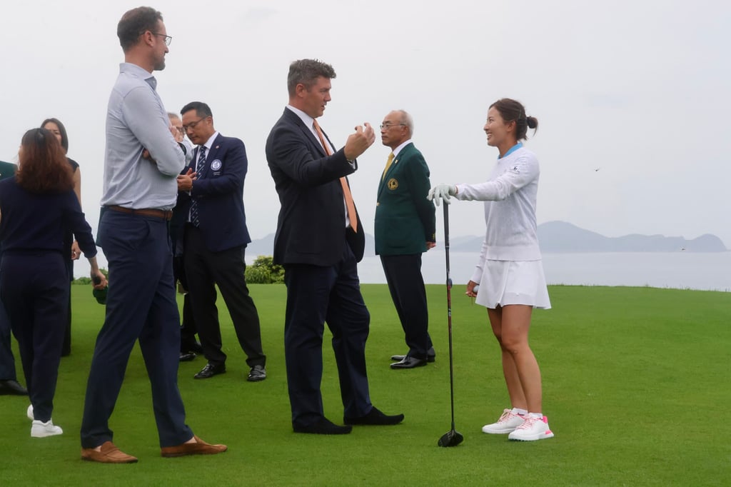 Hong Kong’s Tiffany Chan (right) chats to LPGA chief Chris Madsen before hitting a ceremonial tee shot at Clearwater Bay Golf and Country Club. Photo: Jonathan Wong Hong Kong’s Tiffany Chan (right) chats to LPGA chief Chris Madsen before hitting a ceremonial tee shot at Clearwater Bay Golf and Country Club. Photo: Jonathan Wong
