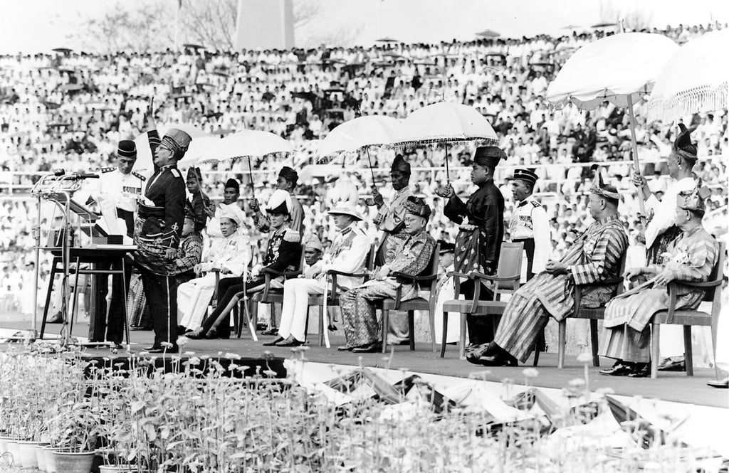 Malaysia’s first prime minister Tunku Abdul Rahman (second from left, with arm raised) declares his country’s independence from British rule at Stadium Negara in Kuala Lumpur on August 31, 1957. Photo: AFP Malaysia’s first prime minister Tunku Abdul Rahman (second from left, with arm raised) declares his country’s independence from British rule at Stadium Negara in Kuala Lumpur on August 31, 1957. Photo: AFP