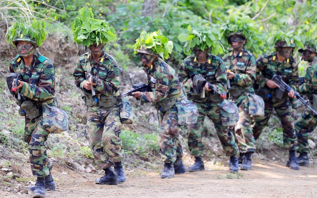 Cadets undergo officer evaluation training at the Korea Army Cadet Military School in Goesan county, North Chungcheong province, in May 2012. Photo Korea Times