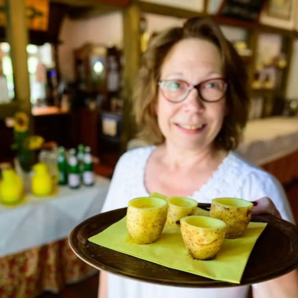 Schnapps served in potatoes-turned-tumblers are offered to guests arriving at the Potato Hotel. Photo: Instagram/kartoffelhotel