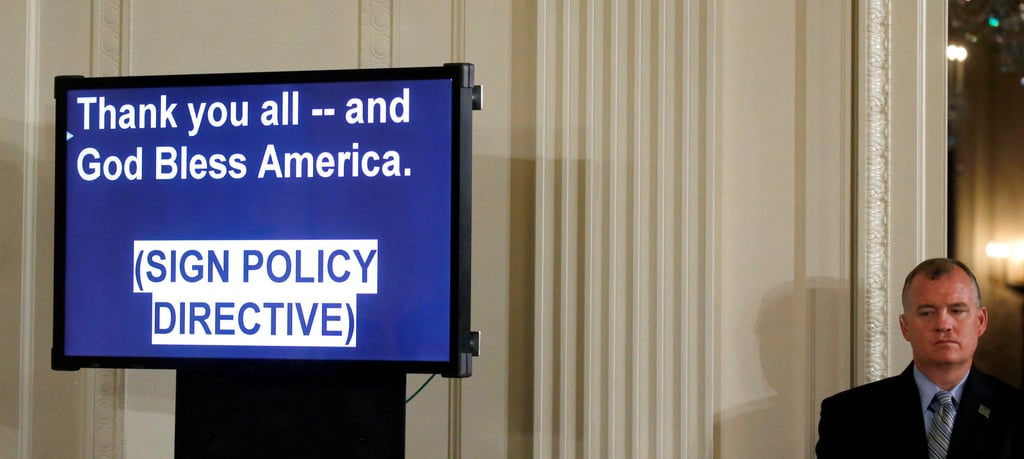 A member of Secret Service stands near a teleprompter as US President Donald Trump addresses a meeting in the White House on June 18, 2018. Photo: Reuters