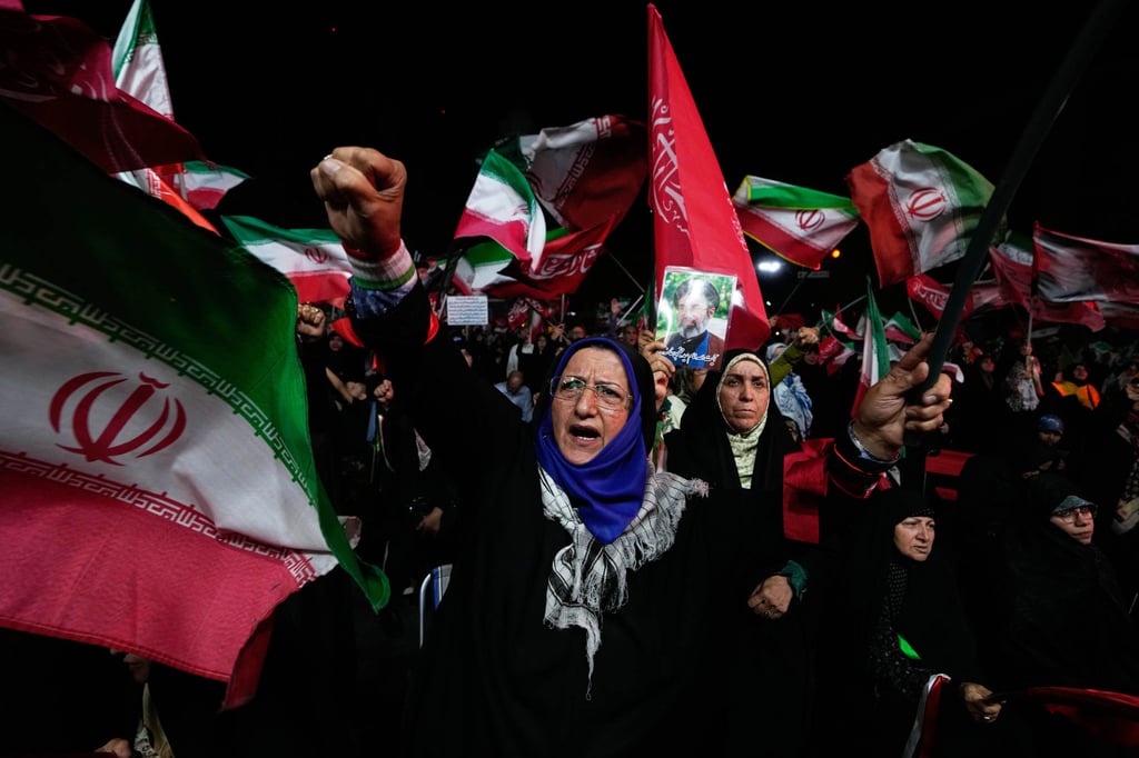 A pro-government demonstrator chants slogans during a gathering in Tehran on Wednesday. Photo: AP