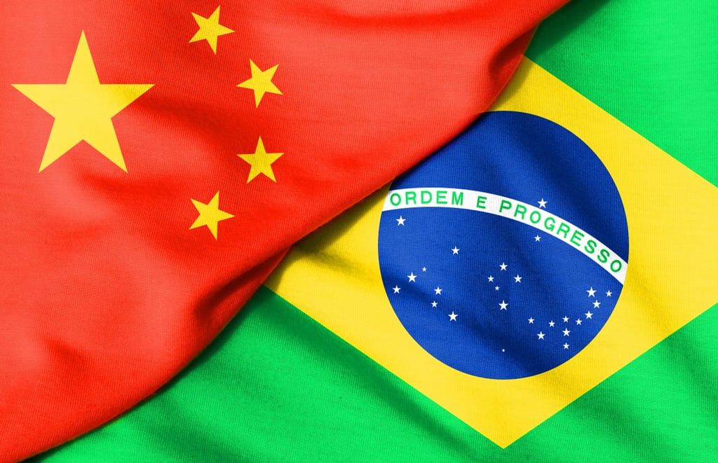Two flags. Flag of China. Flag of Brazil. Photo: Getty Images