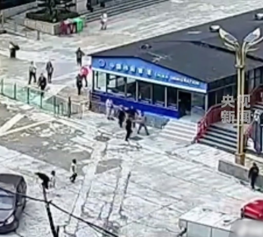A brief video clip shows the officer directing people away from the border post. Photo: CCTV