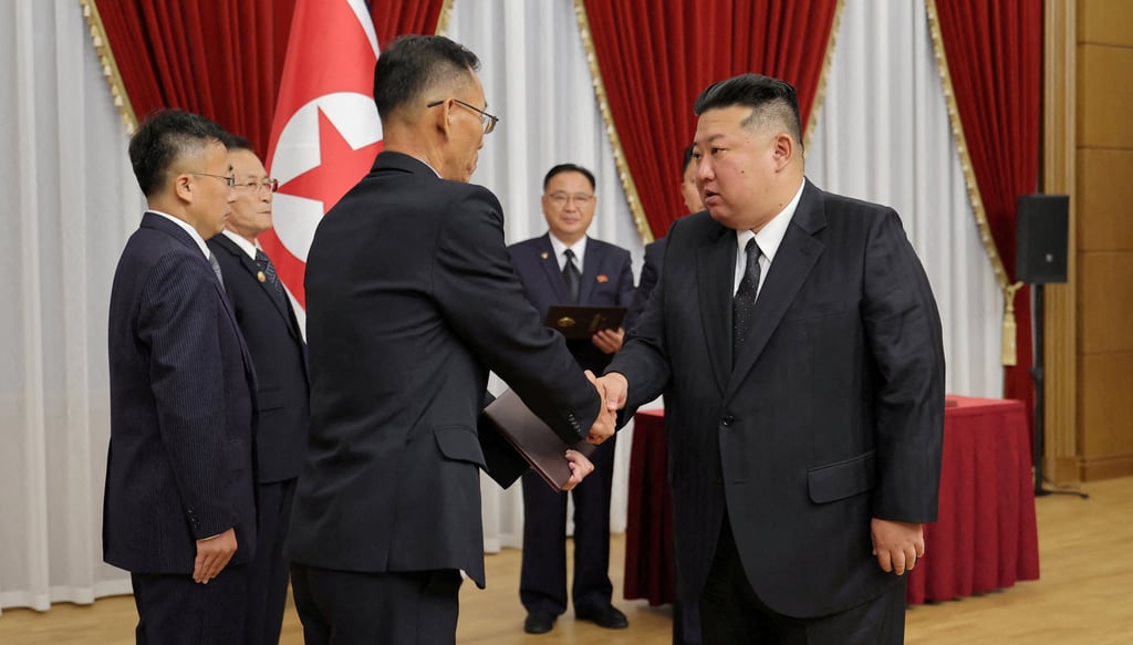 Kim meets scientists, researchers and officials from key national defence research institutions at the headquarters of the Central Committee of the Workers’ Party of Korea in Pyongyang on Saturday. Photo: KCNA via Reuters