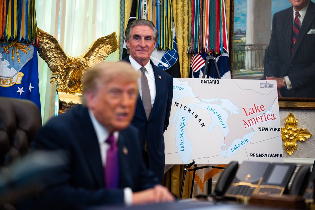 A poster shows the name change from Lake Ontario to “Lake America”, as US President Donald Trump signs an executive order in the Oval Office on Thursday. Photo: EPA