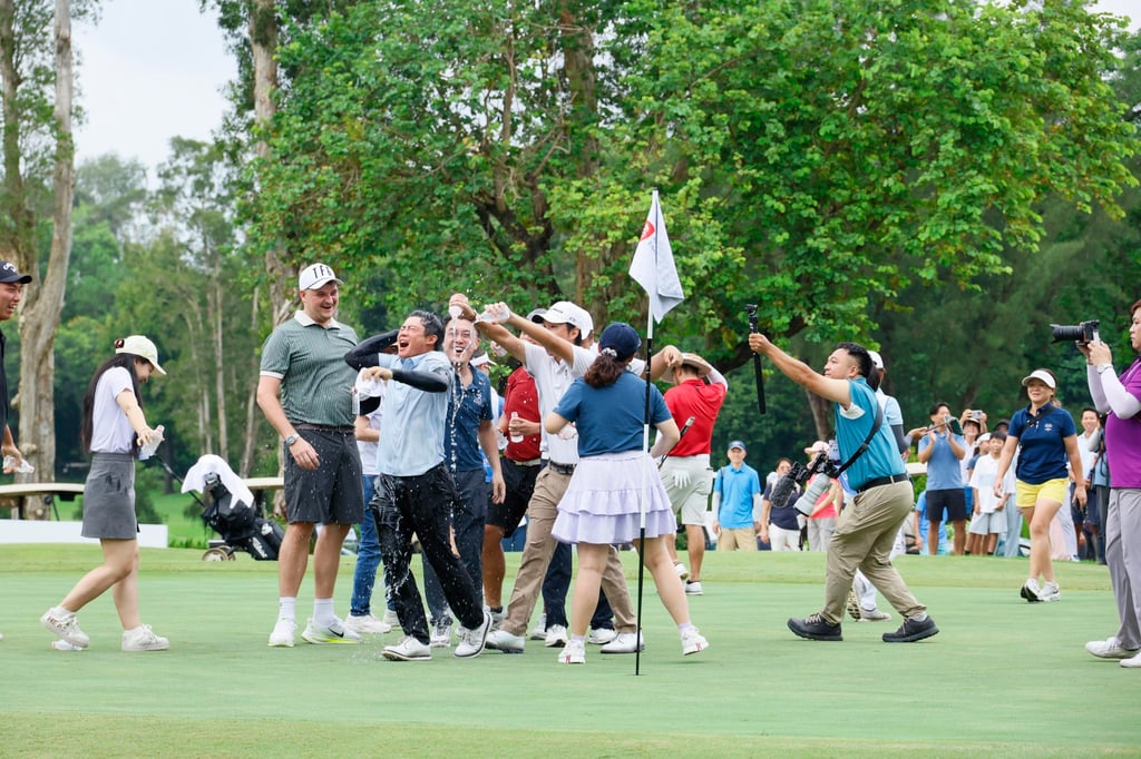 Isaac Lam (centre) is mobbed by supporters after winning the China Tour’s Fanling Classic at Hong Kong Golf Club. Photo: HKGC Isaac Lam (centre) is mobbed by supporters after winning the China Tour’s Fanling Classic at Hong Kong Golf Club. Photo: HKGC