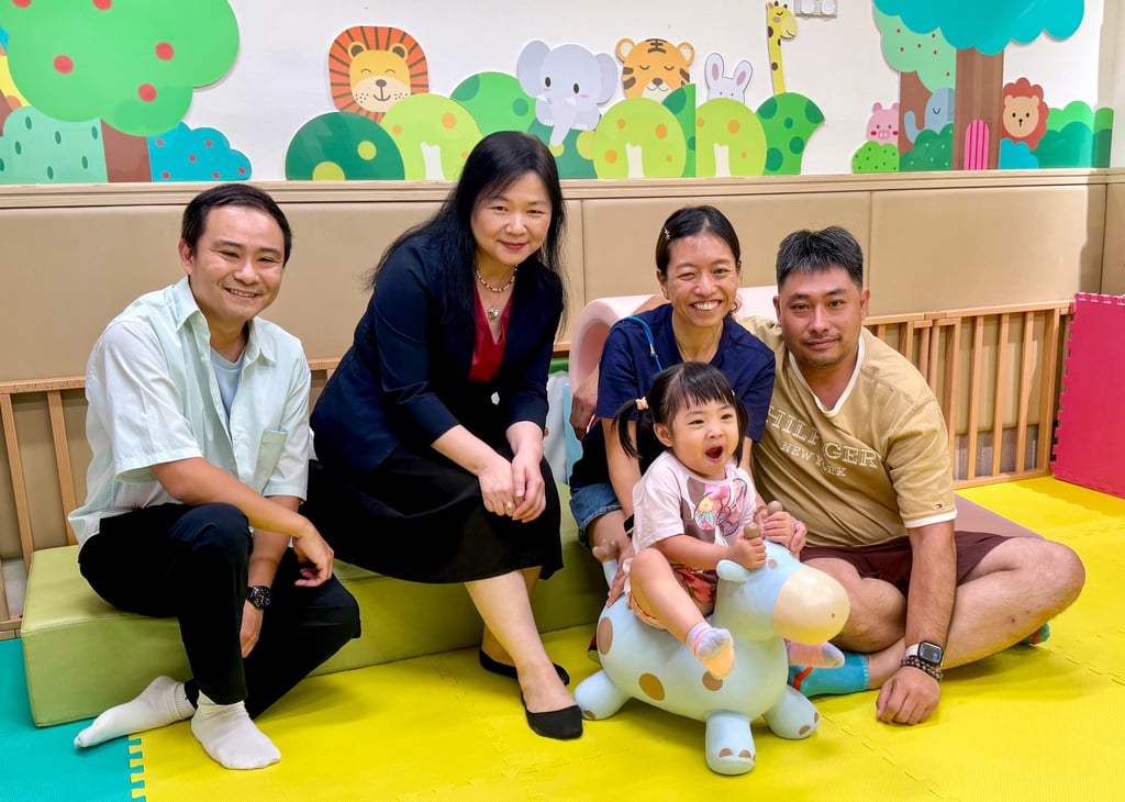 (From left) SKH St Christopher’s Home service director Hong Ho-ching, chief executive Silvia Mak, little Ho-yan and her parents Erica and Charles Lam. Photo: Fiona Chow (From left) SKH St Christopher’s Home service director Hong Ho-ching, chief executive Silvia Mak, little Ho-yan and her parents Erica and Charles Lam. Photo: Fiona Chow