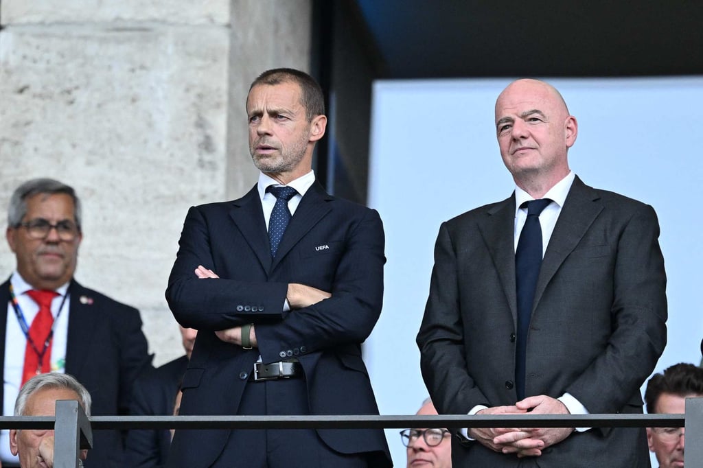 Uefa president Aleksander Ceferin (left) has called the proposal by Fifa head Gianni Infantino (right) a “shady, opaque back room deal”. Photo: AFP Uefa president Aleksander Ceferin (left) has called the proposal by Fifa head Gianni Infantino (right) a “shady, opaque back room deal”. Photo: AFP