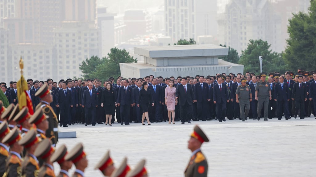Kim Ju-ae (wearing pink) appears with her father Kim Jong-un and other officials at the Revolutionary Martyrs Cemetery in Pyongyang on August 14. Photo: KCNA / Reuters Kim Ju-ae (wearing pink) appears with her father Kim Jong-un and other officials at the Revolutionary Martyrs Cemetery in Pyongyang on August 14. Photo: KCNA / Reuters